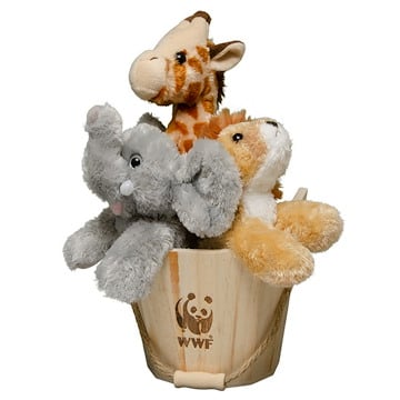 A wooden bucket branded with the WWF logo holds three plush toys shaped like a giraffe, elephant, and lion.
