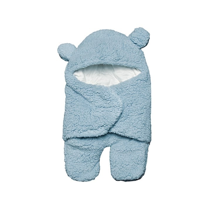 This image shows a cozy baby swaddle blanket in blue, designed to resemble a teddy bear with ears and a fluffy texture.