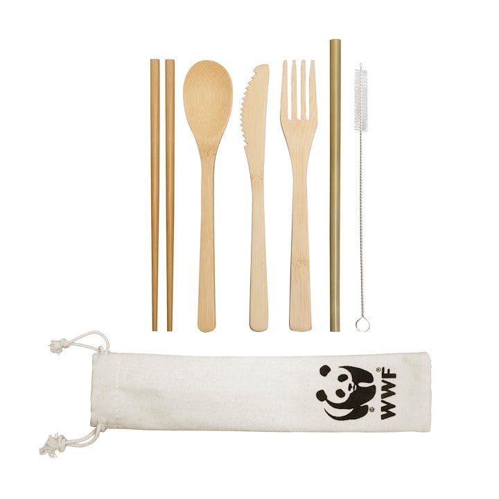The image shows a set of eco-friendly bamboo utensils, including chopsticks, a spoon, a knife, a fork, a straw with a cleaning brush, and a fabric pouch featuring the WWF logo.