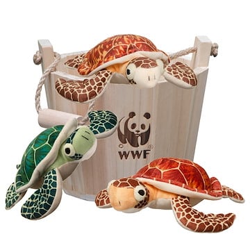 Three plush toy turtles in a wooden bucket with a WWF logo on the front.