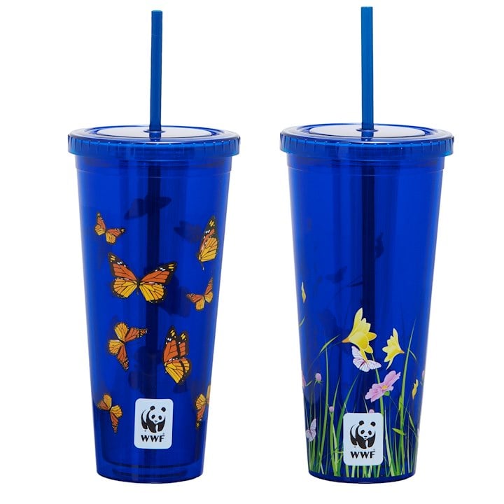 The image shows two blue reusable WWF tumblers with straws, one decorated with orange butterflies and the other with yellow flowers and grass.