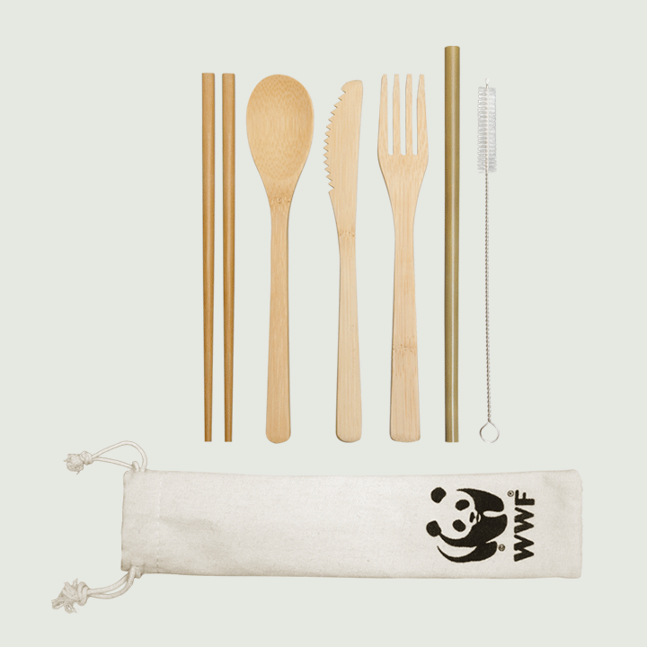 A set of eco-friendly bamboo utensils, including chopsticks, a spoon, a knife, a fork, a straw, a cleaning brush, and a cloth pouch with the WWF logo.