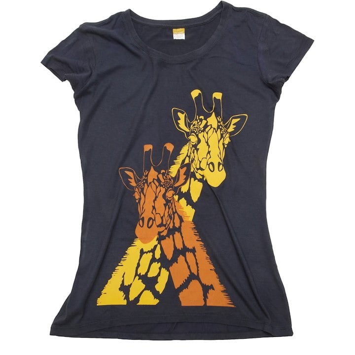 A t-shirt with two shaded orange giraffes on it rubbing necks