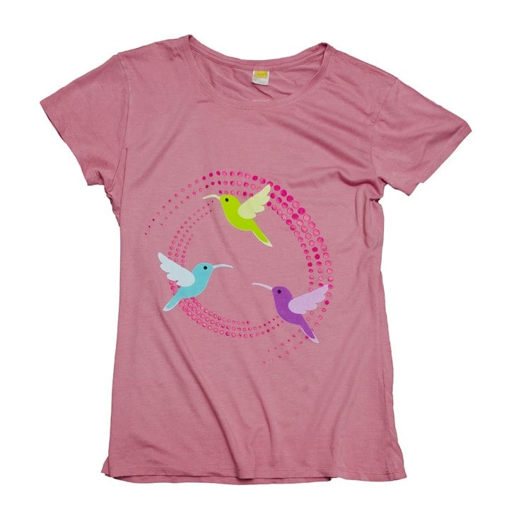 A pink shirt with 3 simple birds on it flying in a circle