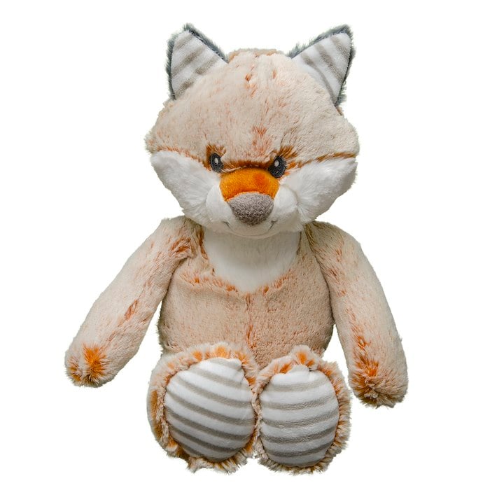 A stuffed red fox on a white background