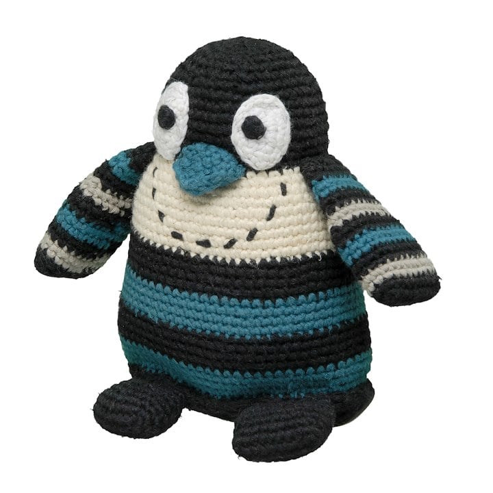 A crocheted plush penguin with black, teal, white, and striped patterns.