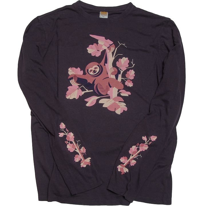 A long sleeved shirt with a sloth on it in trees