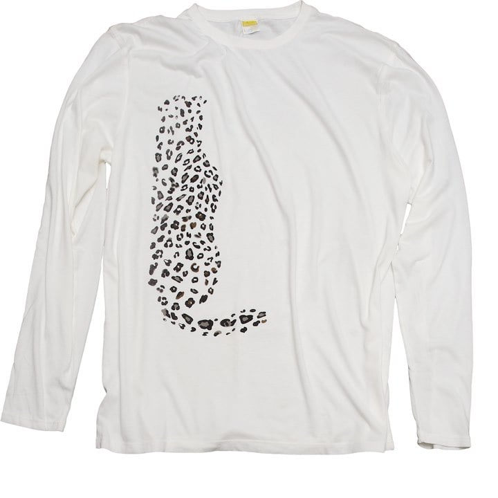 A white long sleeved shirt with a snow leopard design on it
