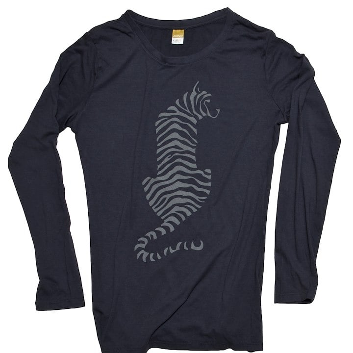A long sleeved shirt with a tiger design