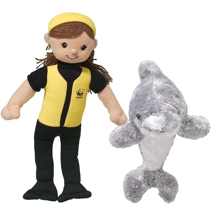 A stuffed dolphin and a marine biologist doll