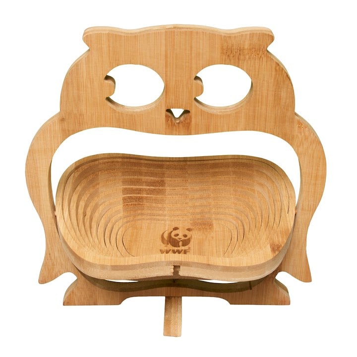 A wooden owl fruit bowl with WWF logo
