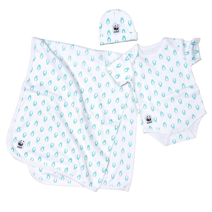 A set of baby clothing and accessories, including a white blanket, a onesie, and a hat, all featuring a blue penguin print and a small panda logo.