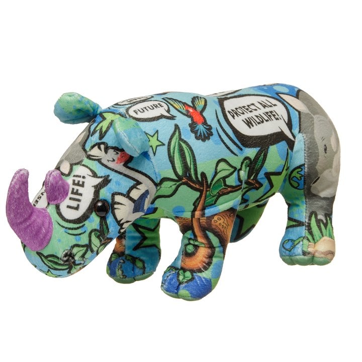 A colorful, cartoon-themed stuffed rhino toy with patterns and text promoting wildlife conservation.