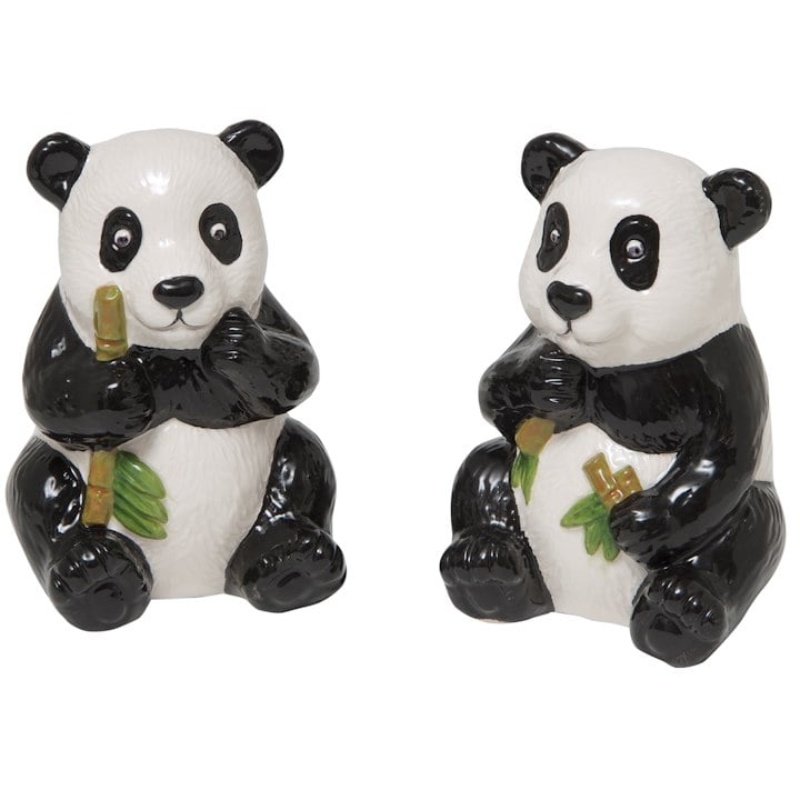A couple of panda shakers holding bamboo