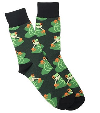 A pair of dark green socks with a colorful tree frog and leaf pattern.