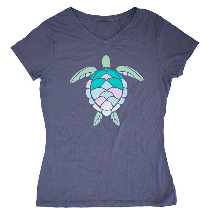 A dark gray V-neck T-shirt featuring a colorful mosaic-style sea turtle design on the front.